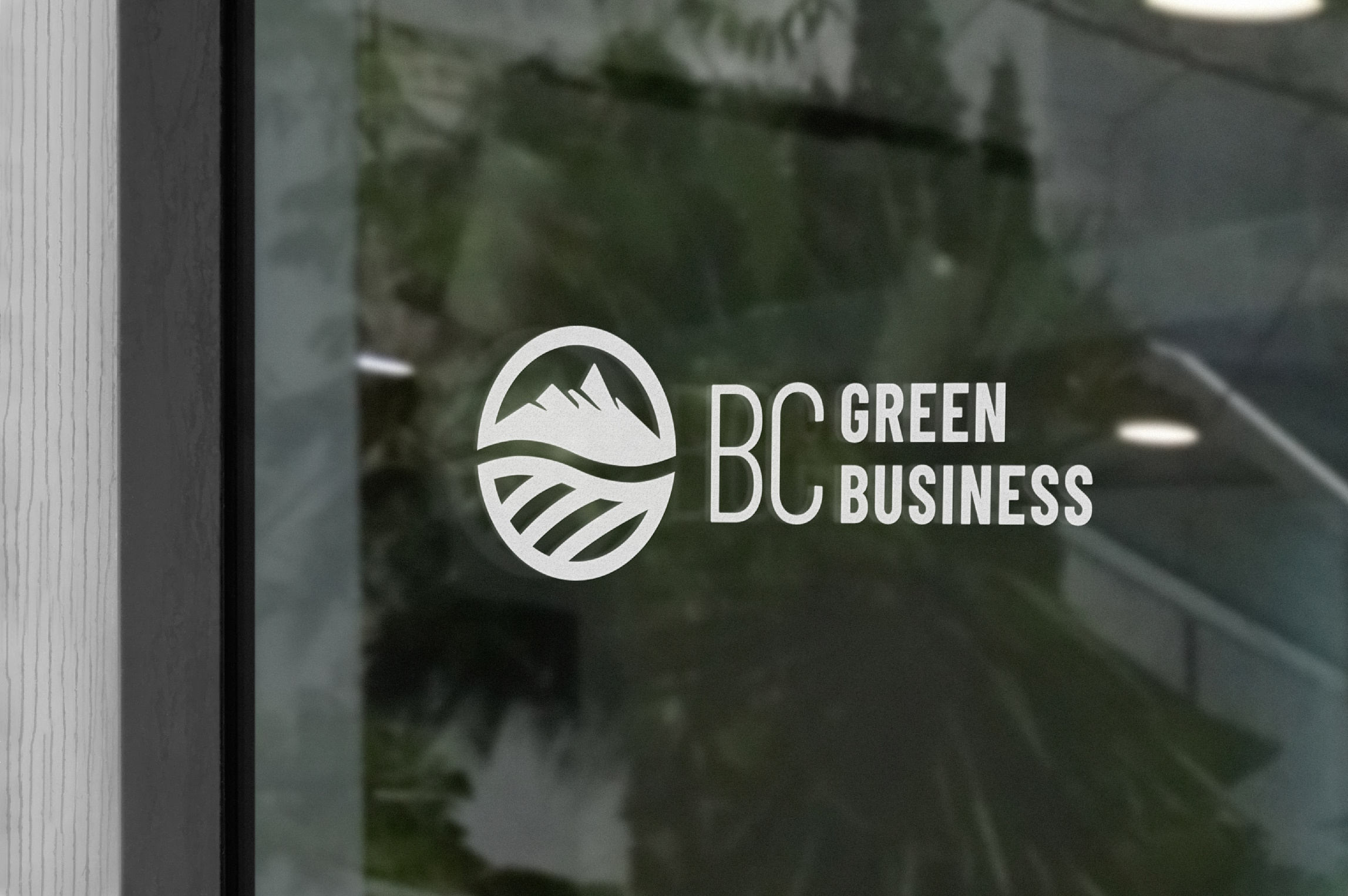 White BC Green Business logo on a window, designed by Array Marketing Agency, Nanaimo, BC.