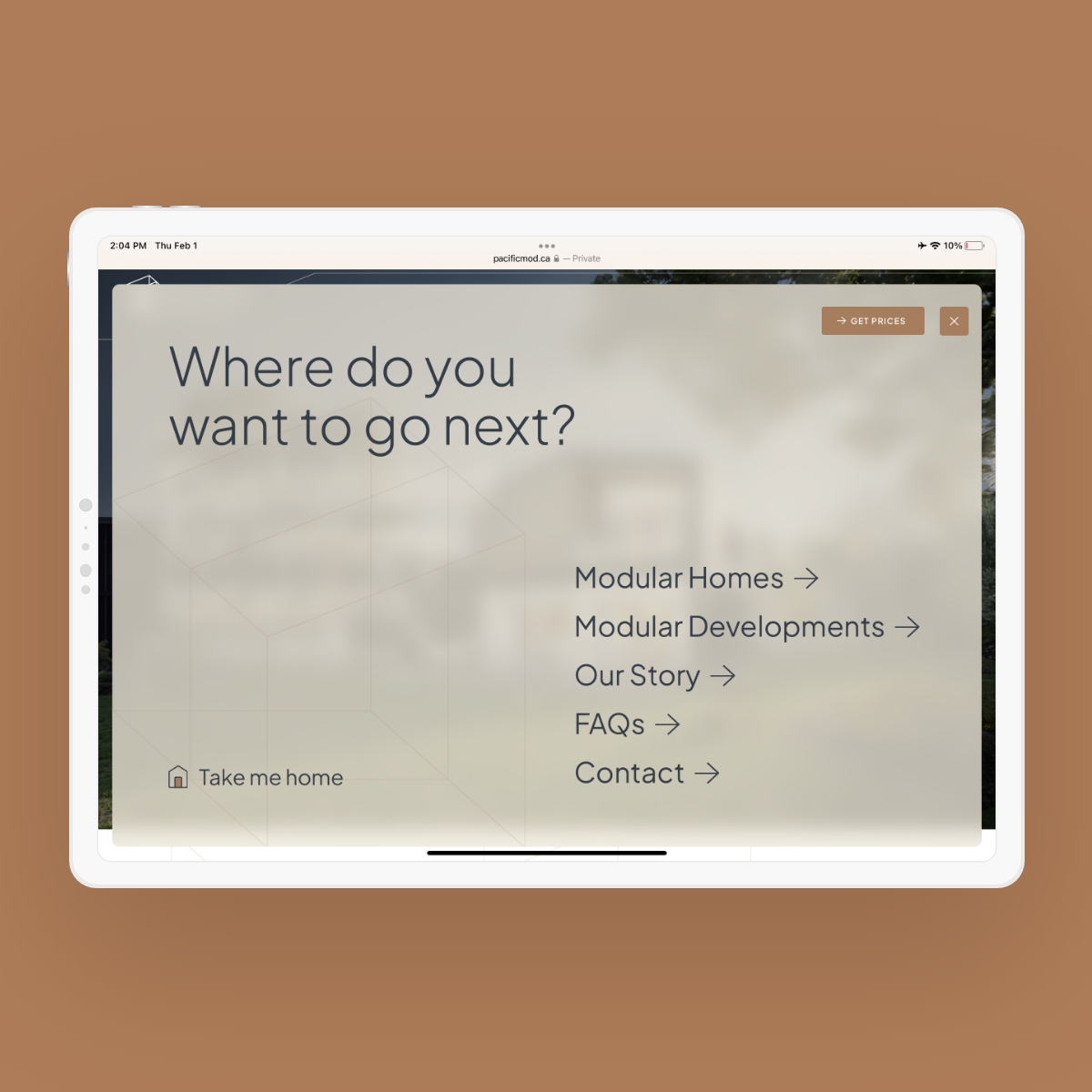 Tablet with mockup of Pacific Modular's website showcasing responsive design.